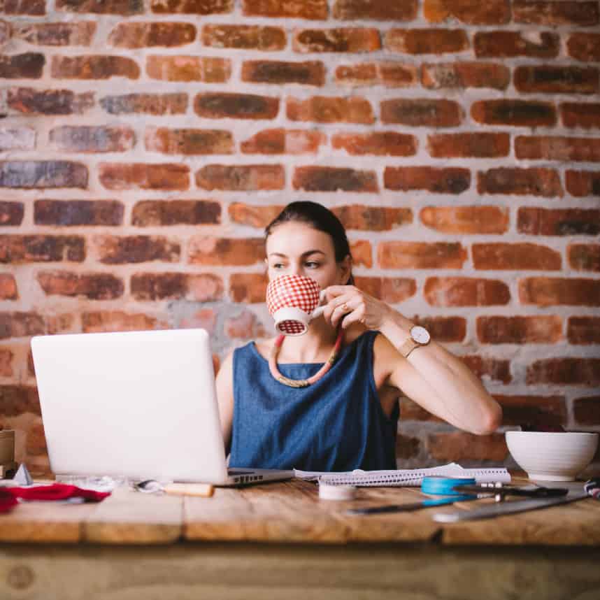 businesswoman laptop drinking notebook